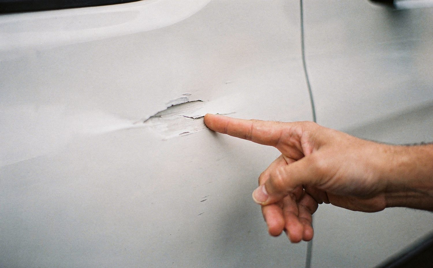 Inspecting damage on a delivery van