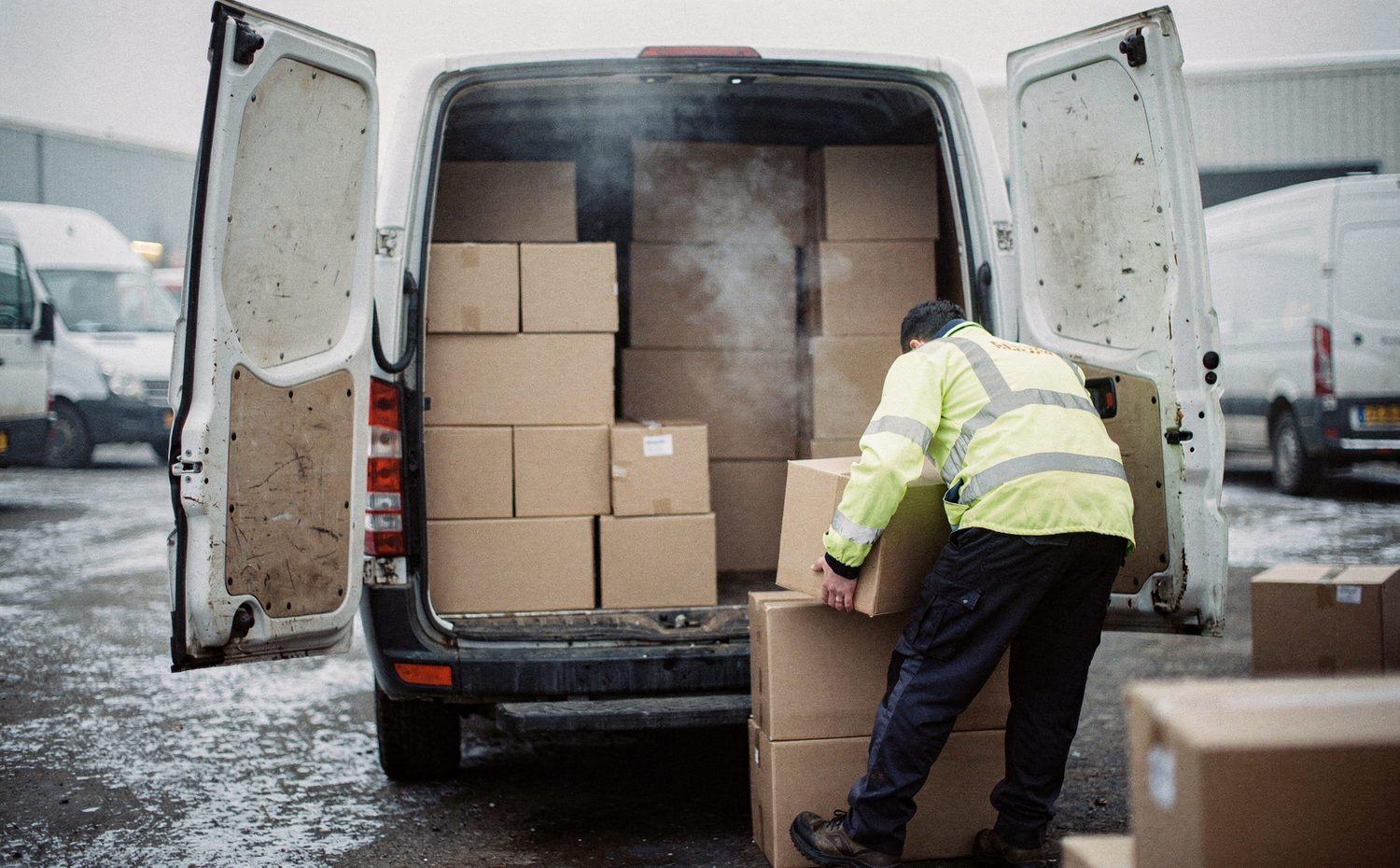 Parcels being loaded at a UK delivery depot