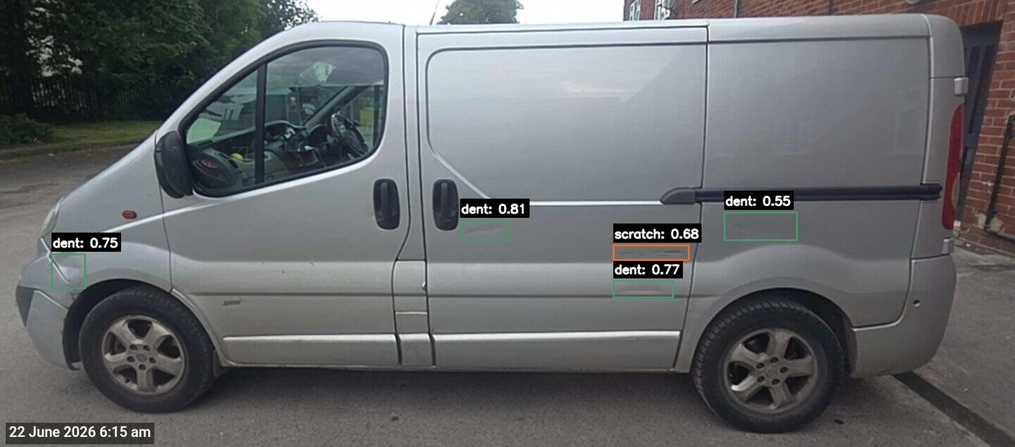 A real Verion AI damage detection: 5 regions flagged on a delivery vehicle